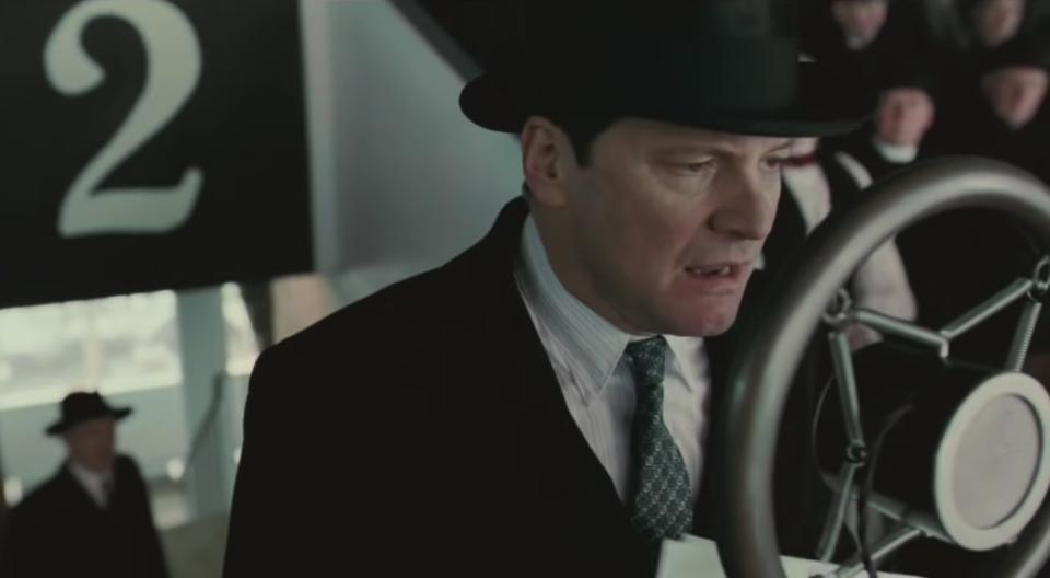Colin Firth talking into a microphone in "The King's Speech"