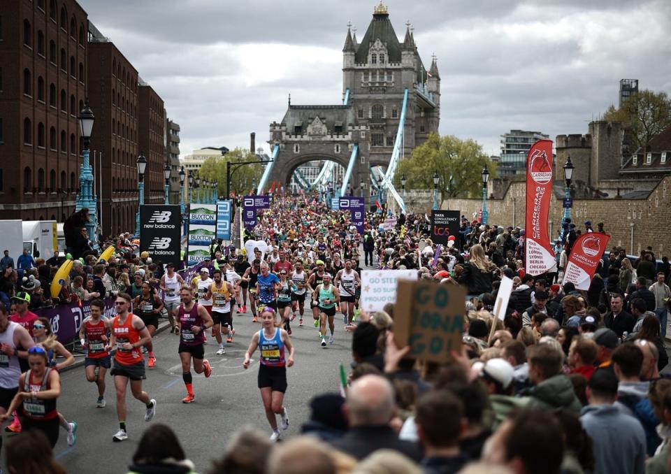 Runners cross Tower Bridge at the half way mark (AFP via Getty Images)