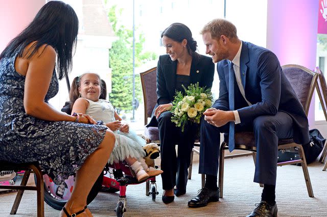 VICTORIA JONES/AFP via Getty Meghan Markle and Prince Harry at the 2018 WellChild Awards