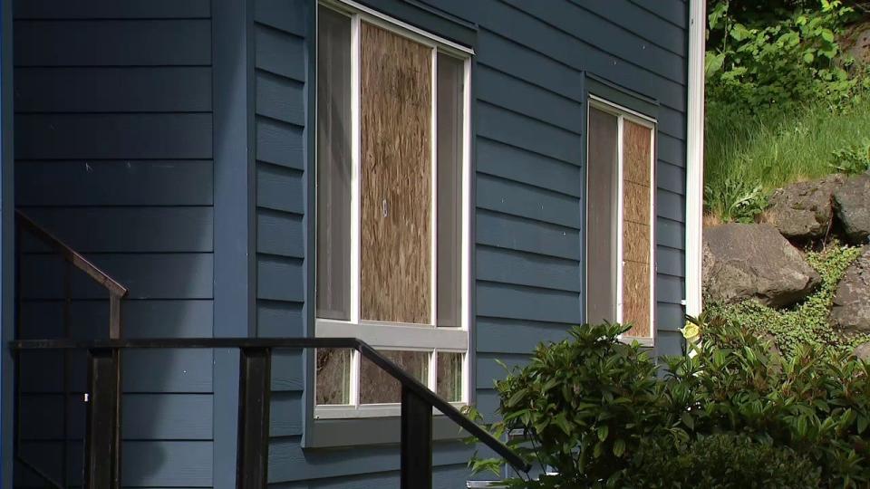 boarded up windows at apartment building