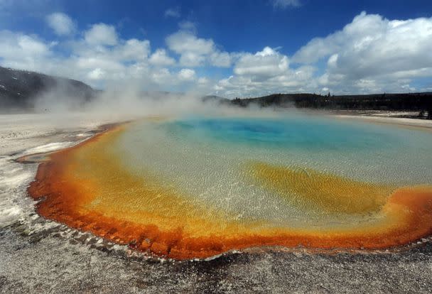 PHOTO: FILE - View of the 'Sunset Lake' hot spring with it's unique colors caused by brown, orange and yellow algae-like bacteria called Thermophiles, that thrive in the cooling water turning the vivid aqua-blues to a murkier greenish brown (Mark Ralston/AFP via Getty Images, FILE)