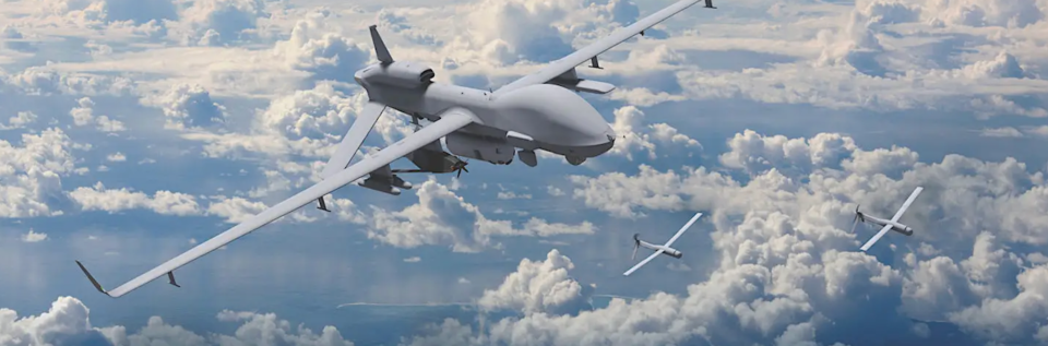 Concept artwork of an MQ-1C Gray Eagle carrying, among other things, an unnamed smaller unmanned aircraft capable of being launched in mid-air under its right wing. Two Area-I ALTIUS-600 drones are also seen flying to the right. <em>GA-ASI</em>