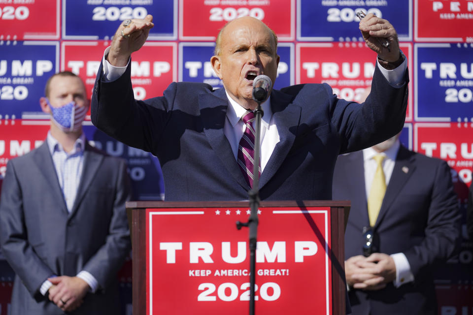 Former New York mayor Rudy Giuliani, a lawyer for President Donald Trump, pauses as he speaks during a news conference on legal challenges to vote counting in Pennsylvania, Saturday Nov. 7, 2020, in Philadelphia.