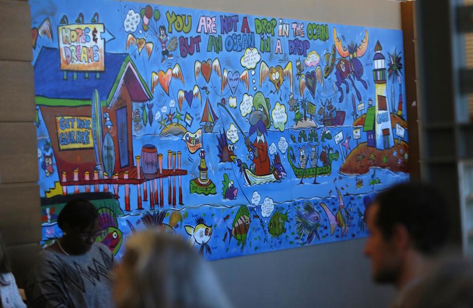The Delaware Children's Department and the Office of Child Advocates unveiled a mural in Family Court that was donated in honor of Judge Alan N. Cooper, who died in 2015. It was created by kids in the foster care system.