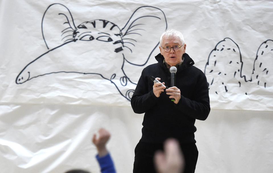 Marc Brown, Erie native and children's book author, draws in illustration with the input from the students at Grandview Elementary School on March 4, 2020. Brown, who attended Lakewood Elementary School and then McDowell High School, credited his childhood education to his success as an author.