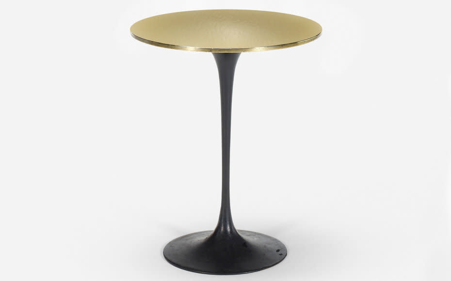 <p>Eero Saarinen designed these <a rel="nofollow noopener" href="https://www.wright20.com/auctions/2016/07/the-four-seasons/127" target="_blank" data-ylk="slk:custom Tulip tables;elm:context_link;itc:0;sec:content-canvas" class="link ">custom Tulip tables </a>for the bar of the Grill Room. They're expected to sell for between $5,000 and $7,000.</p>