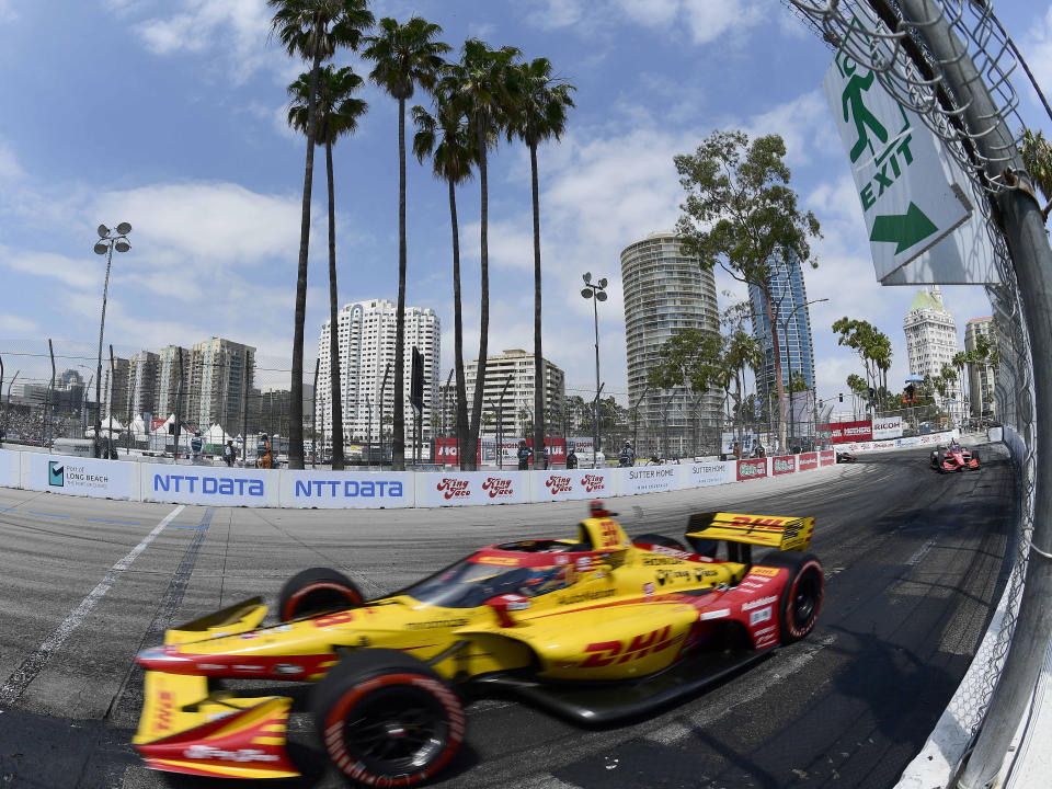 Indycar driver Romain Grosjean races down Shoreline Drive during the 47th annual Acura Grand Prix of Long Beach on Sunday, April 10, 2022. Josef Newgarden won the race. (Will Lester/The Orange County Register via AP)