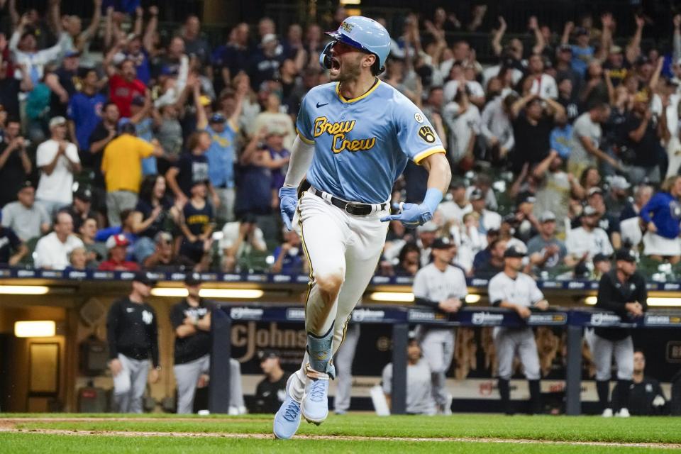 Milwaukee Brewers' Garrett Mitchell hits a game winning walk off single during the ninth inning of a baseball game against the New York Yankees Friday, Sept. 16, 2022, in Milwaukee. The Brewers won 7-6. (AP Photo/Morry Gash)