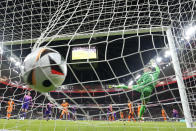 Netherlands' goalkeeper Bart Verbruggen fails to make a save during the international friendly soccer match between Germany and Netherlands at the Deutsche Bank Park in Frankfurt, Germany on Tuesday, March 26, 2024. (AP Photo/Martin Meissner)