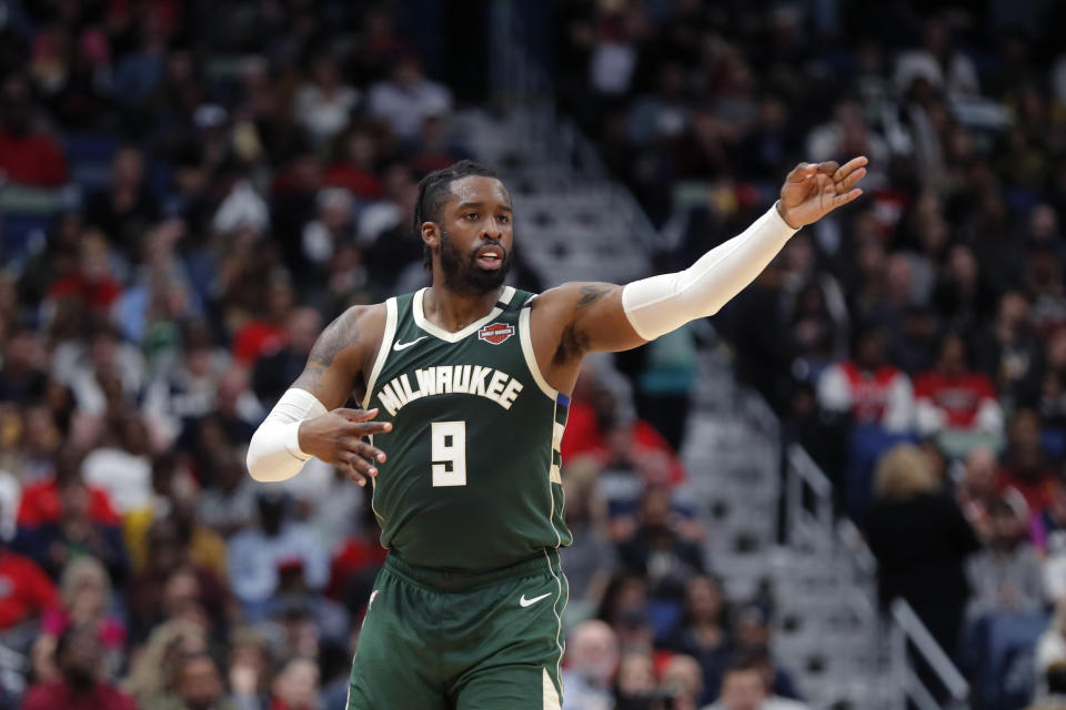 Milwaukee Bucks guard Wesley Matthews (9) reacts after making a 3-point shot in the second half of an NBA basketball game against the New Orleans Pelicans in New Orleans, Tuesday, Feb. 4, 2020. The Bucks won 120-108. (AP Photo/Gerald Herbert)