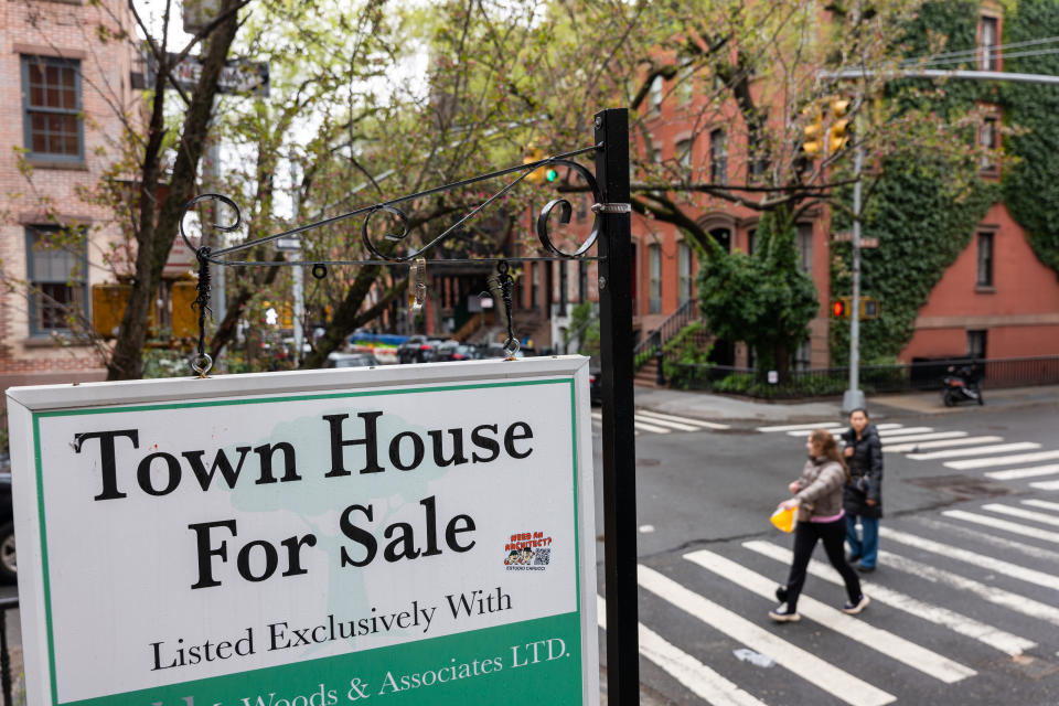 A sign advertising a home for sale is displayed outside of a Manhattan building on April 11, 2024 in New York City. As consumer inflation remained high last month, Americans are seeing steep increases in the price of rent, home, gas and food among other essential items. (Credit: Spencer Platt, Getty Images)