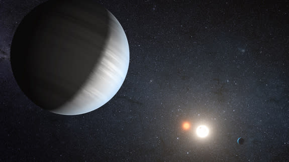 An artist's illustration of the alien solar system Kepler-47, a twin star system that is home to two planets. The planets have two suns like the fictional planet Tatooine in the "Star Wars" universe.