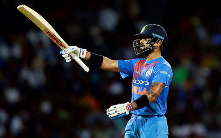 Cricket - Only T20 Match - Sri Lanka v India - Colombo, Sri Lanka - September 6, 2017 - India's captain Virat Kohli celebrates his half century. REUTERS/Dinuka Liyanawatte