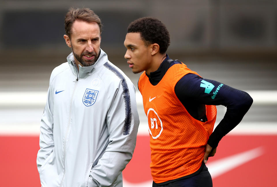 File photo dated 06-09-2019 of England manager Gareth Southgate (left) speaks with Trent Alexander-Arnold. Issue date: Tuesday May 25, 2021.