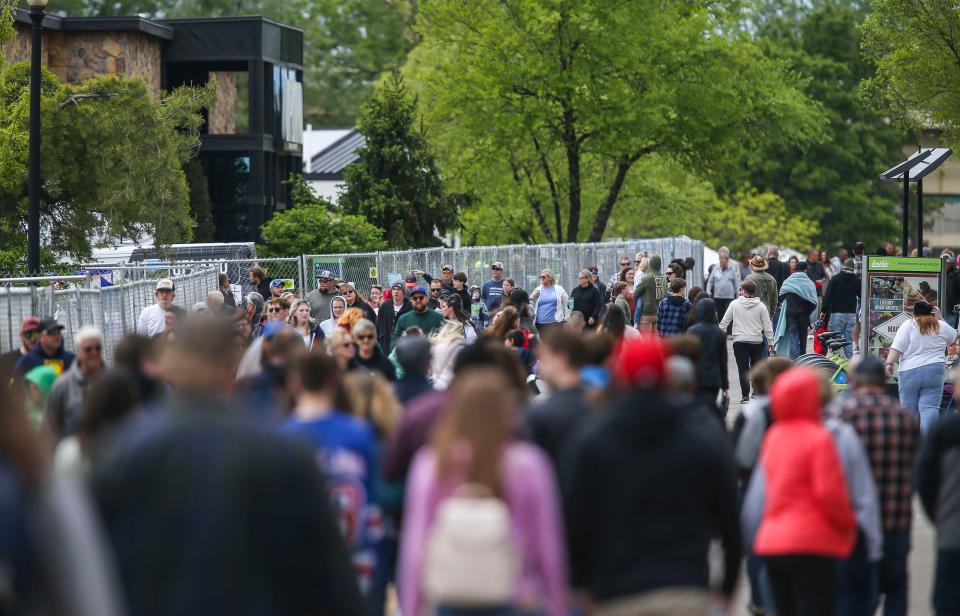 People attend the Thunder Over Louisville airshow in Southern Indiana on April 22, 2023.