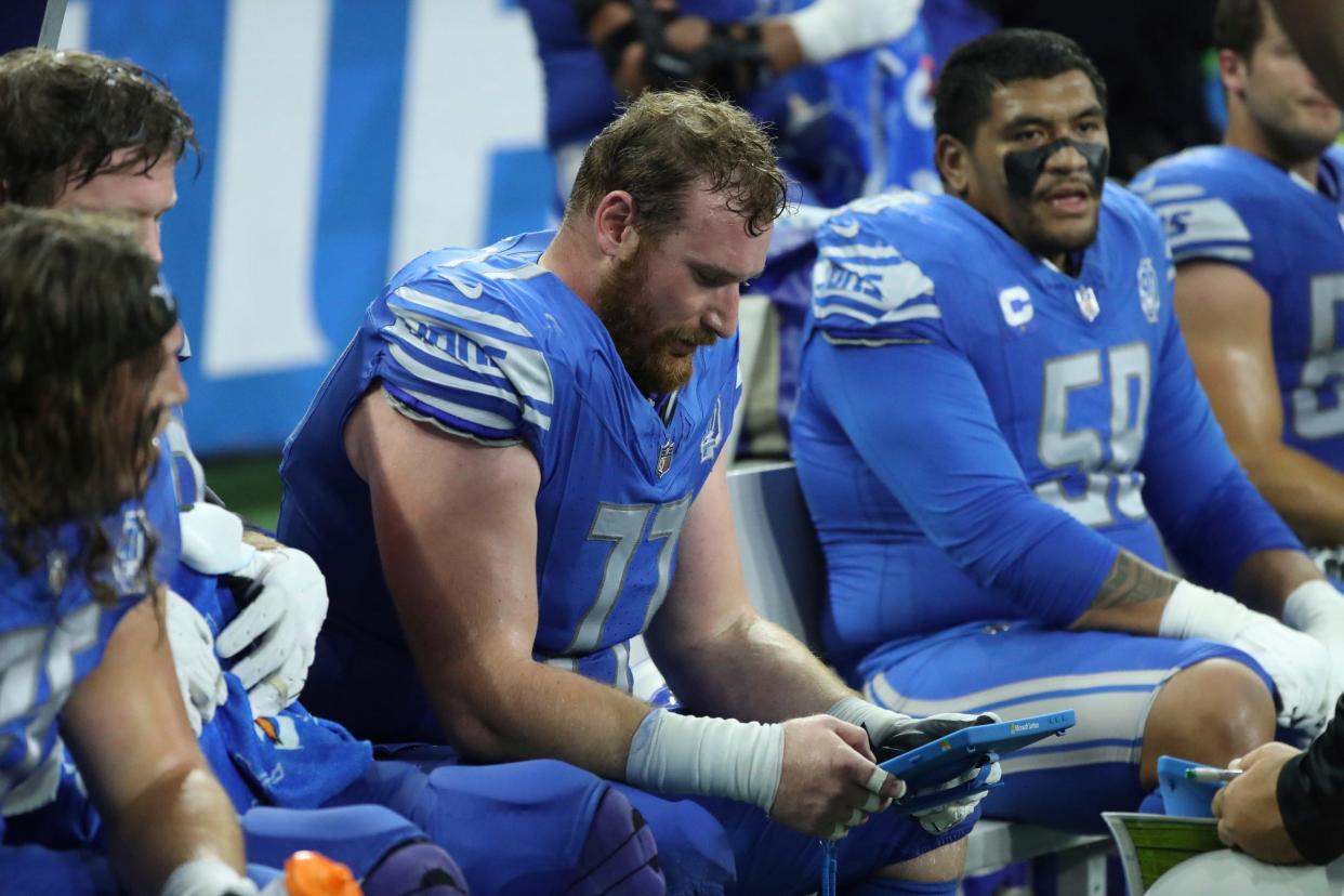 Detroit Lions center Frank Ragnow (77) on the sidelines during action against the Atlanta Falcons at Ford Field in Detroit on Sunday, Sept. 24, 2023.