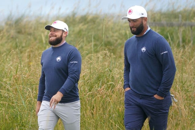 Tyrrell Hatton, left, and Jon Rahm wearing their 'Legion XIII' LIV Golf clothing during a practice day at The Open