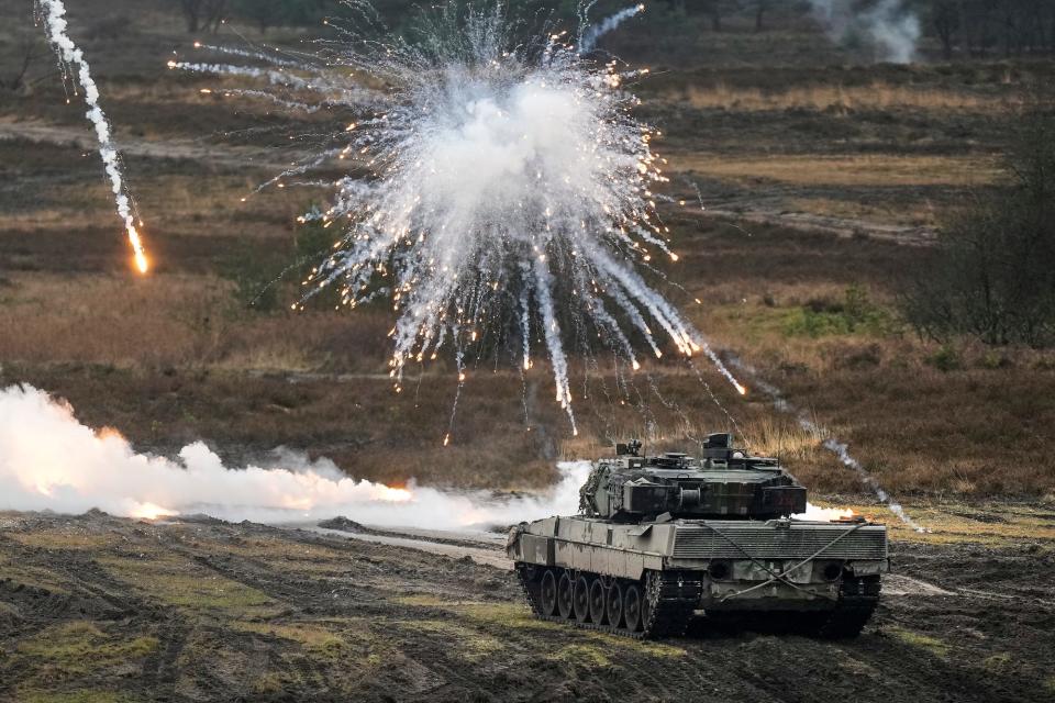 A Leopard 2 tank is seen in action at the Bundeswehr tank battalion 203 at the Field Marshal Rommel Barracks in Augustdorf, Germany, Wednesday, Feb. 1, 2023.