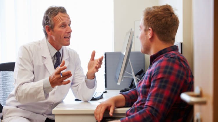 Doctor with patient