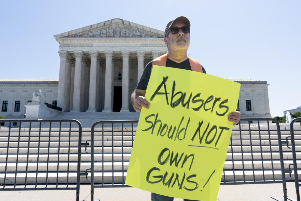 Rev. Patrick Mahoney demonstrates as the Supreme Court announces decisions, on Capitol Hill in Washington, Friday, June 21, 2024. The court upheld a law that prevents people who are subject to a restraining order for domestic violence from possessing firearms. The justices are also still weighing whether former President Donald Trump is immune from criminal prosecution in the election interference case against him, roughly two months after hearing arguments. (AP Photo/J. Scott Applewhite)