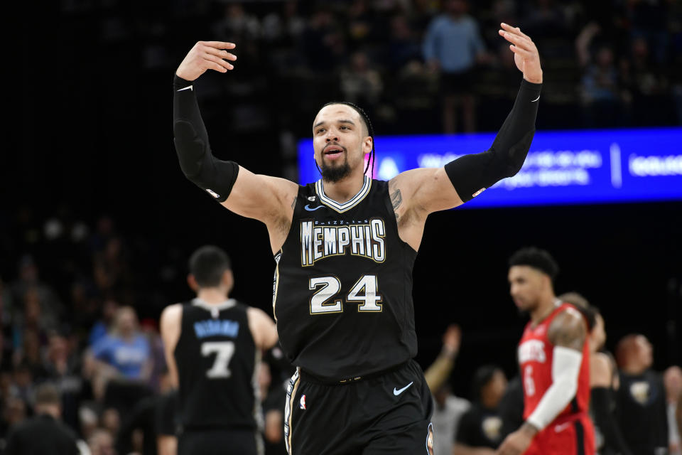 Memphis Grizzlies forward Dillon Brooks (24) gestures to fans in the first half of an NBA basketball game against the Houston Rockets, Friday, March 24, 2023, in Memphis, Tenn. (AP Photo/Brandon Dill)