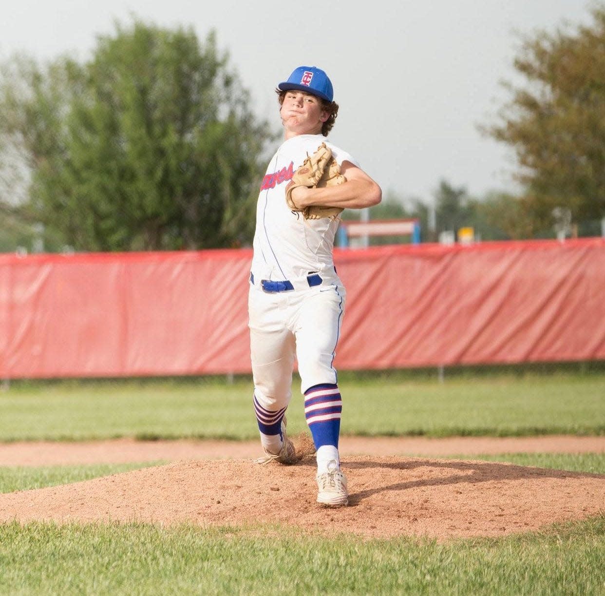 Indian Creek's Carter Modlin pitches a ball.