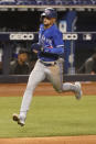 Toronto Blue Jays' Cavan Biggio runs to score the winning run during the ninth inning of a baseball game against the Miami Marlins, Tuesday, June 22, 2021, in Miami. (AP Photo/Marta Lavandier)