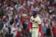 Philadelphia Phillies' Rhys Hoskins celebrates his two-run home run during the third inning in Game 5 of the baseball NL Championship Series between the San Diego Padres and the Philadelphia Phillies on Sunday, Oct. 23, 2022, in Philadelphia. (AP Photo/Matt Slocum)
