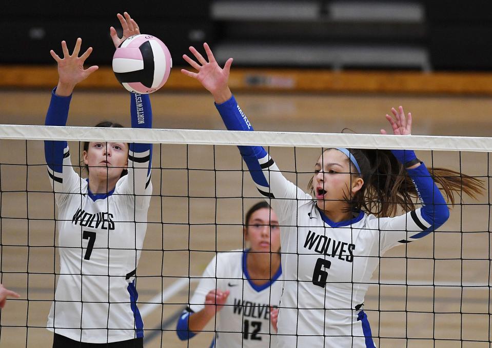 Waukee Northwest's Sadie Maas (7) and Kamryn Vogt (6) go for a block against Eddyville-Blakesburg-Fremont at the Southeast Polk Invitational on Sept. 10 in Pleasant Hill. Northwest won the tournament.