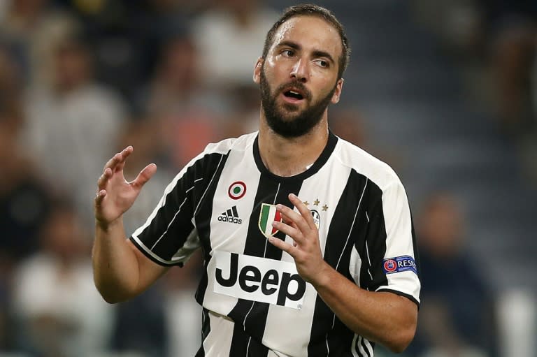 Juventus' Gonzalo Higuain reacts during the UEFA Champions League football match against FC Sevilla on September 14, 2016 in Turin