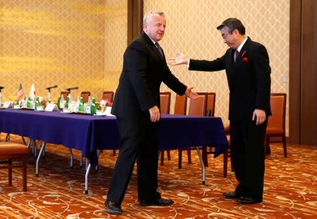 U.S. Deputy Secretary of State John Sullivan (L) is escorted by his Japanese counterpart Vice Foreign Minister Shinsuke Sugiyama before their talks at the Foreign Ministry's Iikura guest house in Tokyo, Japan October 17, 2017. REUTERS/Issei Kato