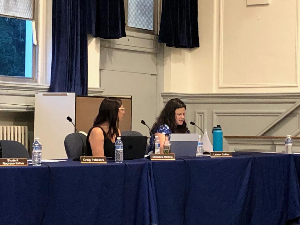 Sparta Board of Education member Lauren Collier, right, explains changes to the district's policy for challenging library materials as fellow board member Christina Keiling looks on Thursday, July 20, 2023.