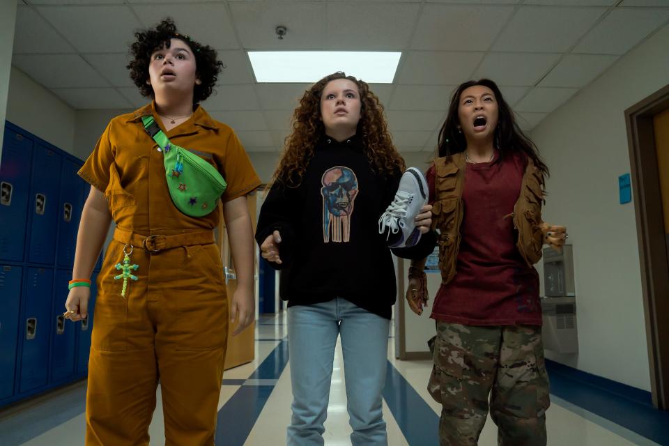 Alex Cooper Cohen (far left), Darby Camp and Emmy Liu-Wang play friends who try to find their missing friend after a wild night they don't remember in "The Slumber Party."