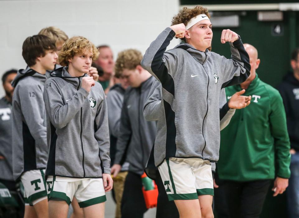 The Trinity bench reacts during a Rocks' increasing lead in the second half against DeSales. Trinity defeated the Colts 54-49. Nov. 29, 2022