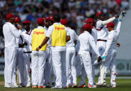 Cricket - England vs West Indies - First Test - Birmingham, Britain - August 17, 2017 West Indies' Jason Holder celebrates the wicket of England's Tom Westley with teammates Action Images via Reuters/Paul Childs