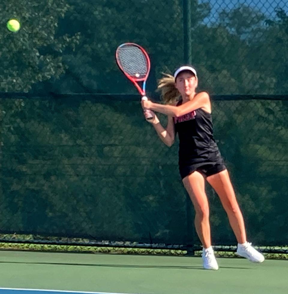 Cathedral Prep's Anna Poranski returns a backhand shot at Fairview's Vivian Liu in their No. 1 singles match during Wednesday's Region 2 girls tennis dual between the Ramblers and Tigers at the Chris Batchelor Memorial Courts. Although Liu beat Poranski 6-2, 6-0, the Ramblers still won 3-2.