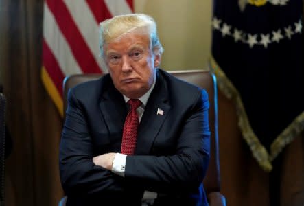 U.S. President Donald Trump looks up as he holds a Cabinet meeting at the White House in Washington, U.S., October 17, 2018. REUTERS/Kevin Lamarque