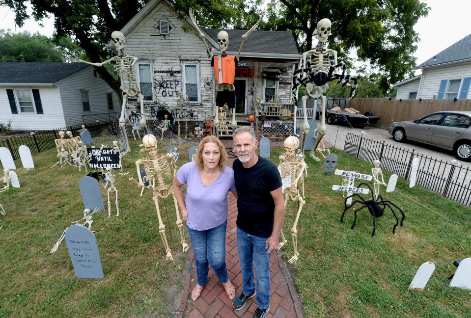 Jennifer Kamm and Ed Stark at their Halloween-decorated home on Eastman Avenue in Springfield on Monday, Sept. 11, 2023.