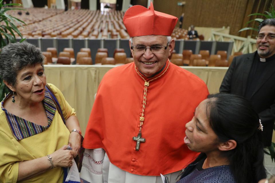 Cardinal Alvaro Leonel Ramazzini Imeri meets relatives and friends after he was elevated to cardinal by Pope Francis, at the Vatican, Saturday, Oct. 5, 2019. Pope Francis has chosen 13 men he admires and whose sympathies align with his to become the Catholic Church's newest cardinals. (AP Photo/Andrew Medichini)