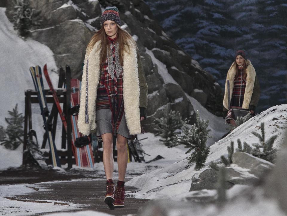 Fashion from the Tommy Hilfiger Fall 2014 collection is modeled during New York Fashion Week on Monday Feb. 10, 2014. (AP Photo/Bebeto Matthews)