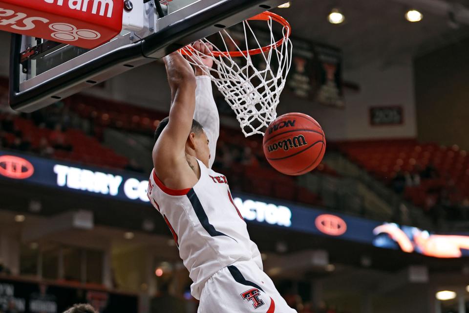 Texas Tech's Kevin McCullar (15) dunks the ball during the first half of a nonconference game against Eastern Washington on Wednesday at United Supermarkets Arena.