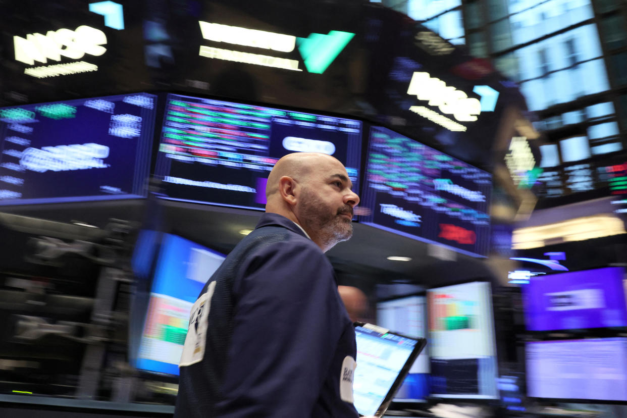 FTSE  A trader works on the floor at the New York Stock Exchange (NYSE) in New York City, U.S., October 27, 2023.  REUTERS/Brendan McDermid