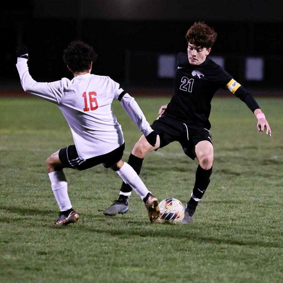 Weston Ranch midfielder Alejandro Aguilar and Lincoln defender Luis Ochoa battle for a 50/50 ball during a game at Weston Ranch High School in Stockton, CA