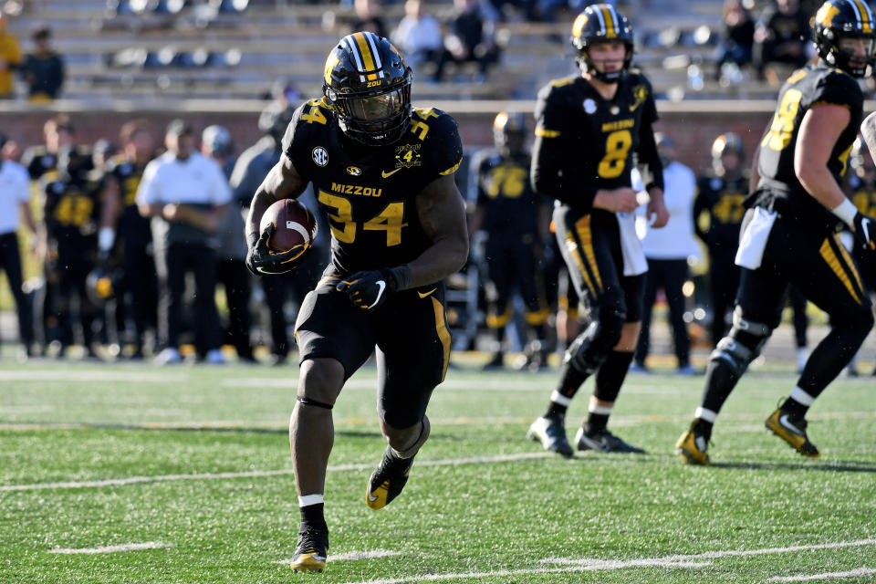 Missouri running back Larry Rountree III scores on a touchdown run during the second half of an NCAA college football game against Arkansas Saturday, Dec. 5, 2020, in Columbia, Mo. (AP Photo/L.G. Patterson)