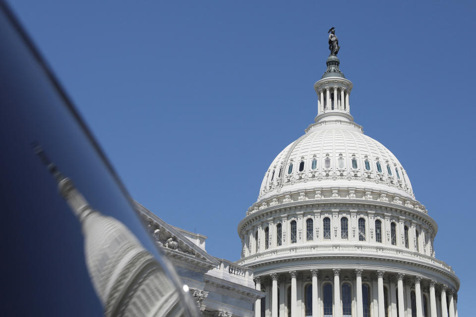 The dome of the U.S. Capitol is reflected in a window on  Capitol Hill in Washington, U.S., April 20, 2023. REUTERS/Amanda Andrade-Rhoades