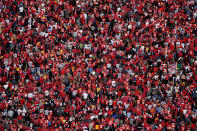 FILE - Fans watch as the Kansas City Chiefs celebrate during their victory rally at Union Station in Kansas City, Mo., Wednesday, Feb. 14, 2024. The Chiefs defeated the San Francisco 49ers Sunday in the NFL Super Bowl 58 football game. (AP Photo/Charlie Riedel, File)