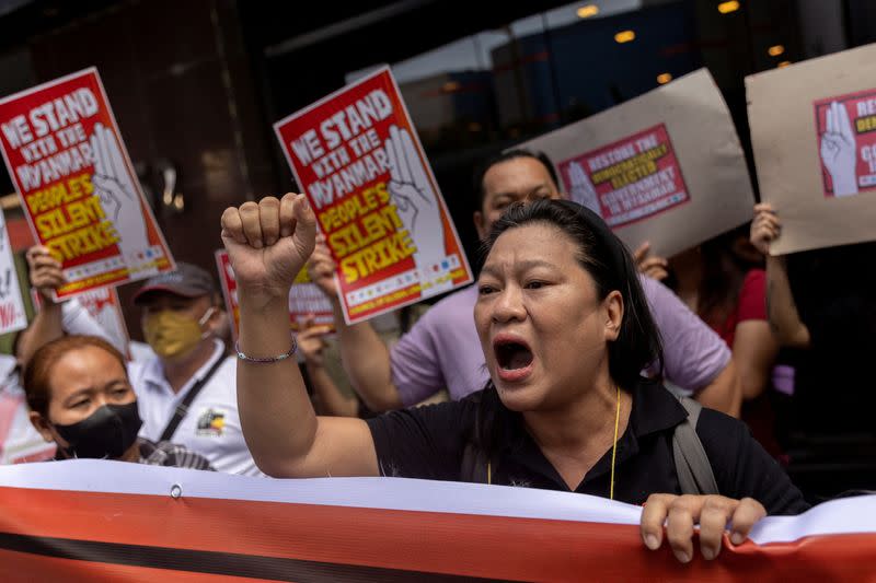 Filipino activists stage a protest in solidarity with Myanmar citizens in Makati City