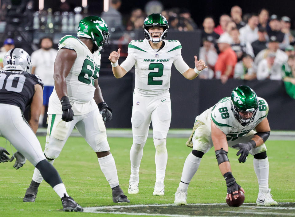 LAS VEGAS, NEVADA – NOVEMBER 12: Guard Xavier Newman #65, quarterback Zach Wilson #2 and center Joe Tippmann #66 of the New York Jets get ready to run a play against the <a class="link " href="https://sports.yahoo.com/nfl/teams/las-vegas/" data-i13n="sec:content-canvas;subsec:anchor_text;elm:context_link" data-ylk="slk:Las Vegas Raiders;sec:content-canvas;subsec:anchor_text;elm:context_link;itc:0">Las Vegas Raiders</a> in the second quarter of their game at Allegiant Stadium on November 12, 2023 in Las Vegas, Nevada. The Raiders defeated the Jets 16-12. (Photo by Ethan Miller/Getty Images)