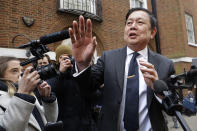 Myanmar's ambassador to the UK, Kyaw Zwar Minn is surrounded by media as he arrives outside the Myanmar Embassy in London, Thursday, April 8, 2021. Myanmar's ambassador to the UK, Kyaw Zwar Minn said on Thursday his country's military has occupied the London embassy and threatened its staff with "severe punishment" if they do not work with the Junta. (AP Photo/Kirsty Wigglesworth)