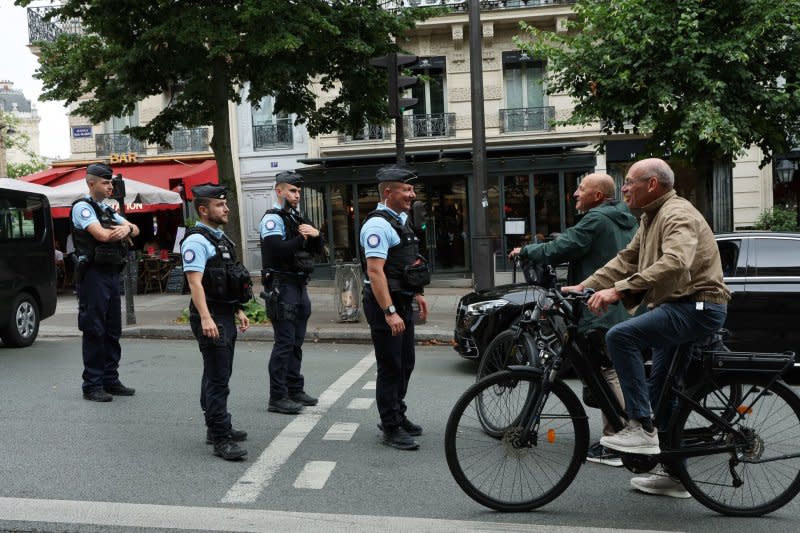 French Police close the roads and step up security ahead of the Olympics opening ceremony. Photo by Hugo Philpott/UPI